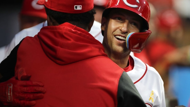 Sep 2, 2022; Cincinnati, Ohio, USA; Cincinnati Reds third baseman Spencer Steer celebrates in the dugout after hitting a solo home run, his first major league home run, against the Colorado Rockies during the fifth inning at Great American Ball Park. Mandatory Credit: David Kohl-USA TODAY Sports