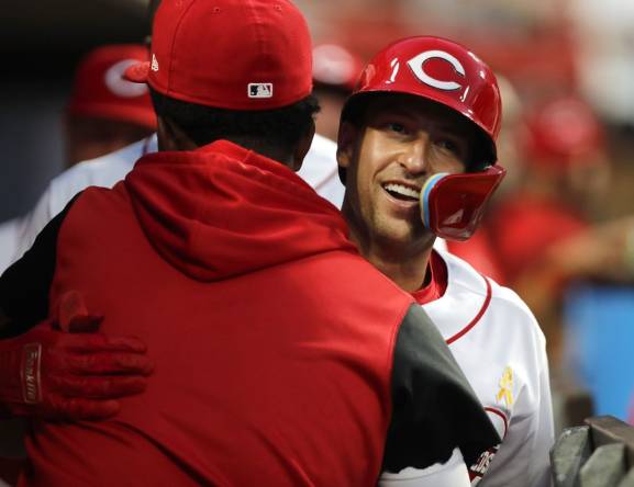 Spencer Steer of the Cincinnati Reds celebrates his solo home run