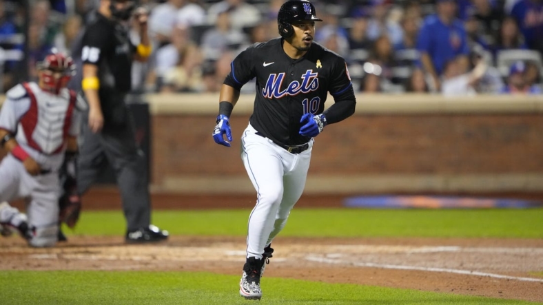 Sep 2, 2022; New York City, New York, USA; New York Mets third baseman Eduardo Escobar (10) rounds the bases after hitting a two run home run against the Washington Nationals during the second inning at Citi Field. Mandatory Credit: Gregory Fisher-USA TODAY Sports
