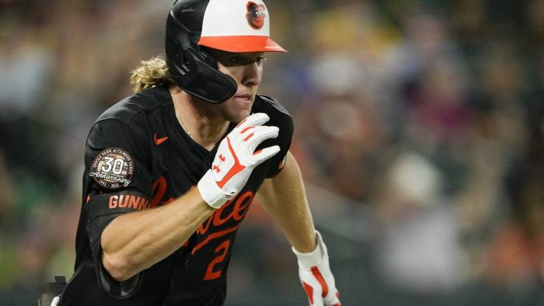 Sep 2, 2022; Baltimore, Maryland, USA; Baltimore Orioles second baseman Gunnar Henderson (2) runs after hitting against the Oakland Athletics during the seventh inning at Oriole Park at Camden Yards. Henderson got a double on the hit. Mandatory Credit: Brent Skeen-USA TODAY Sports