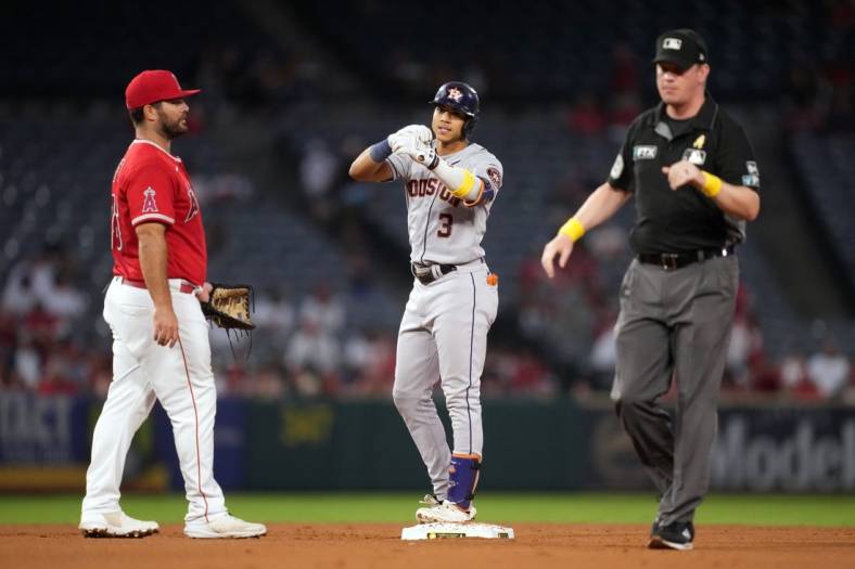 Sep 2, 2022; Anaheim, California, USA; Houston Astros shortstop Jeremy Pena (3) gestures after hitting a run-scoring double in the third inning against the Los Angeles Angels at Angel Stadium. Mandatory Credit: Kirby Lee-USA TODAY Sports