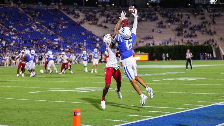 Sep 2, 2022; Durham, North Carolina, USA; Duke Blue Devils wide receiver Eli Pancol (6) jumps to catch the football while Temple Owls cornerback Iverson Clement (22) defends him during second half of the game at Wallace Wade Stadium. Mandatory Credit: Jaylynn Nash-USA TODAY Sports