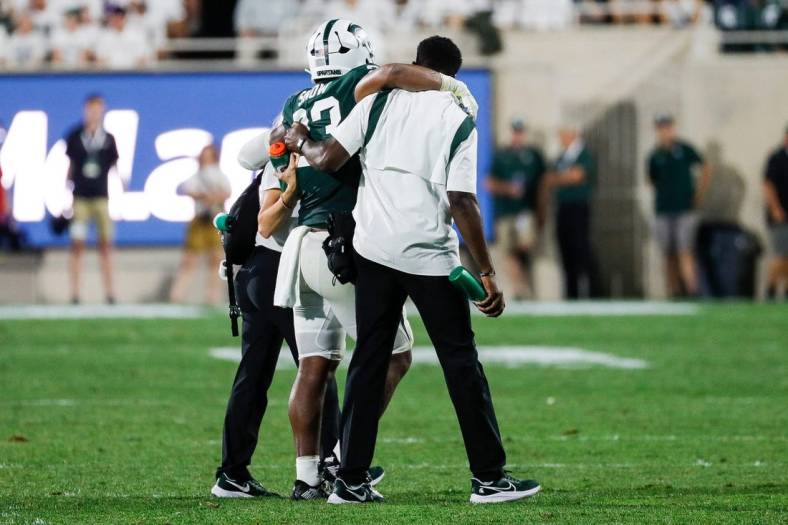 Michigan State linebacker Darius Snow (23) is carried off the field during the first half against Western Michigan at Spartan Stadium in East Lansing on Friday, Sept. 2, 2022.