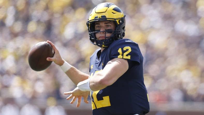 Sep 3, 2022; Ann Arbor, Michigan, USA;  Michigan Wolverines quarterback Cade McNamara (12) passes  in the first half against the Colorado State Rams at Michigan Stadium. Mandatory Credit: Rick Osentoski-USA TODAY Sports