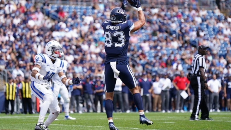Sep 3, 2022; East Hartford, Connecticut, USA; Connecticut Huskies tight end Brandon Niemenski (83) makes the touchdown catch against the Central Connecticut State Blue Devils in the second quarter at Rentschler Field at Pratt & Whitney Stadium. Mandatory Credit: David Butler II-USA TODAY Sports