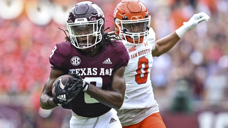 Sep 3, 2022; College Station, Texas, USA;  Texas A&M Aggies wide receiver Yulkeith Brown (8) catches the pass for a touchdown during the first quarter against the Sam Houston State Bearkats at Kyle Field. Mandatory Credit: Maria Lysaker-USA TODAY Sports