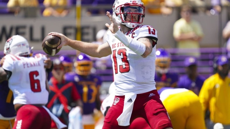 Sep 3, 2022; Greenville, North Carolina, USA;  North Carolina State Wolfpack quarterback Devin Leary (13) throws the ball against the East Carolina Pirates during the first half at Dowdy-Ficklen Stadium. Mandatory Credit: James Guillory-USA TODAY Sports