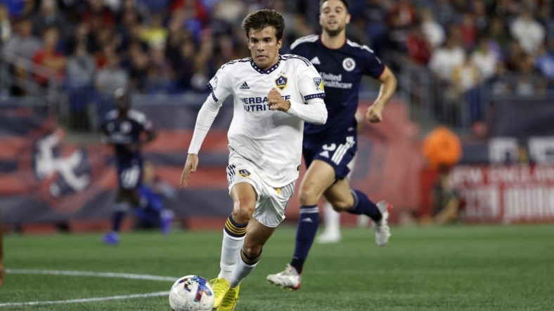 Aug 28, 2022; Foxborough, Massachusetts, USA; Los Angeles Galaxy midfielder Rayan Raveloson (6) during the first half against the New England Revolution at Gillette Stadium. Mandatory Credit: Winslow Townson-USA TODAY Sports
