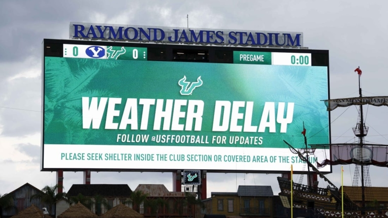 Sep 3, 2022; Tampa, Florida, USA; General view of the jumbotron showing advising of a weather delay of the game between the South Florida Bulls and the Brigham Young Cougars at Raymond James Stadium. Mandatory Credit: Douglas DeFelice-USA TODAY Sports