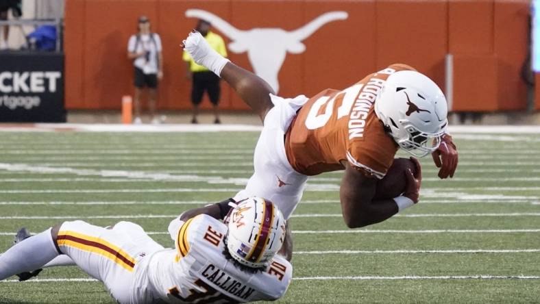 Sep 3, 2022; Austin, Texas, USA; Texas Longhorns running back Bijan Robinson (5) rushes for yards against the Louisiana Monroe Warhawks in the first half at Darrell K Royal-Texas Memorial Stadium. Mandatory Credit: Scott Wachter-USA TODAY Sports