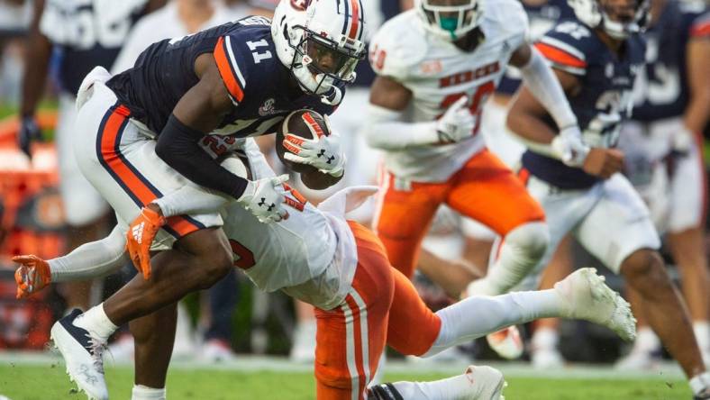 Auburn Tigers wide receiver Shedrick Jackson (11) turns up field after catching a pass as Auburn Tigers take on Mercer Bears at Jordan-Hare Stadium in Auburn, Ala., on Saturday, Sept. 3, 2022. Auburn Tigers leads Mercer Bears 28-7 at halftime.