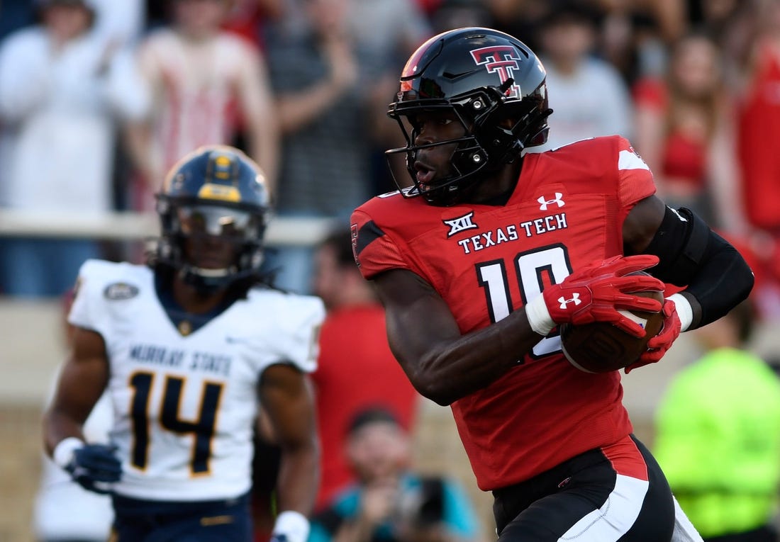 Texas Tech's wide receiver Loic Fouonji (19) runs for a touchdown against Murray State, Saturday, Sept. 3, 2022, at Jones AT&T Stadium.