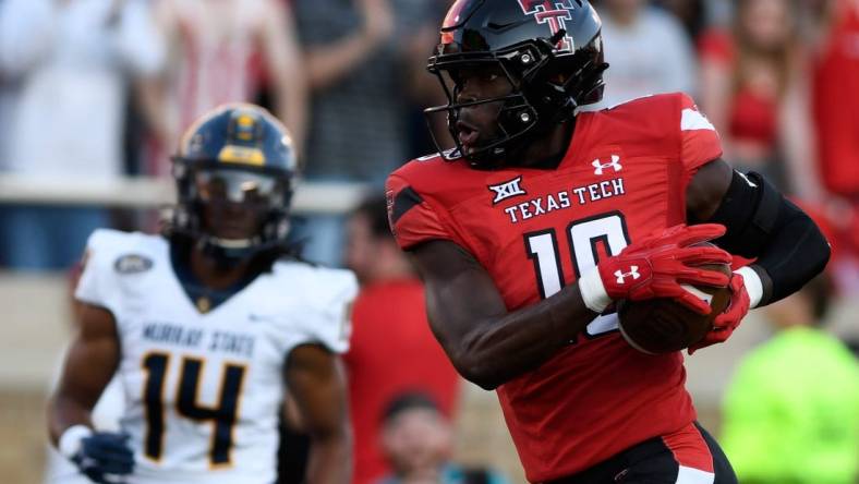 Texas Tech's wide receiver Loic Fouonji (19) runs for a touchdown against Murray State, Saturday, Sept. 3, 2022, at Jones AT&T Stadium.