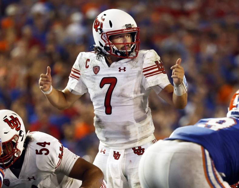 Sep 3, 2022; Gainesville, Florida, USA; Utah Utes quarterback Cameron Rising (7) calls a play against the Florida Gators during the second half at Steve Spurrier-Florida Field. Mandatory Credit: Kim Klement-USA TODAY Sports