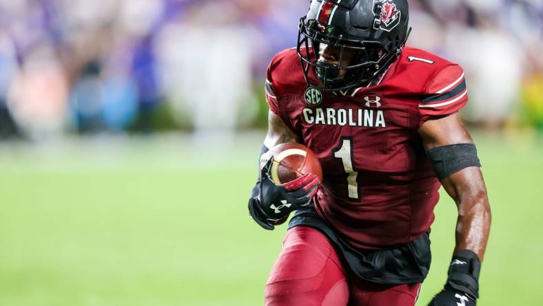 Sep 3, 2022; Columbia, South Carolina, USA; South Carolina Gamecocks running back MarShawn Lloyd (1) rushes for a touchdown against the Georgia State Panthers in the second half at Williams-Brice Stadium. Mandatory Credit: Jeff Blake-USA TODAY Sports