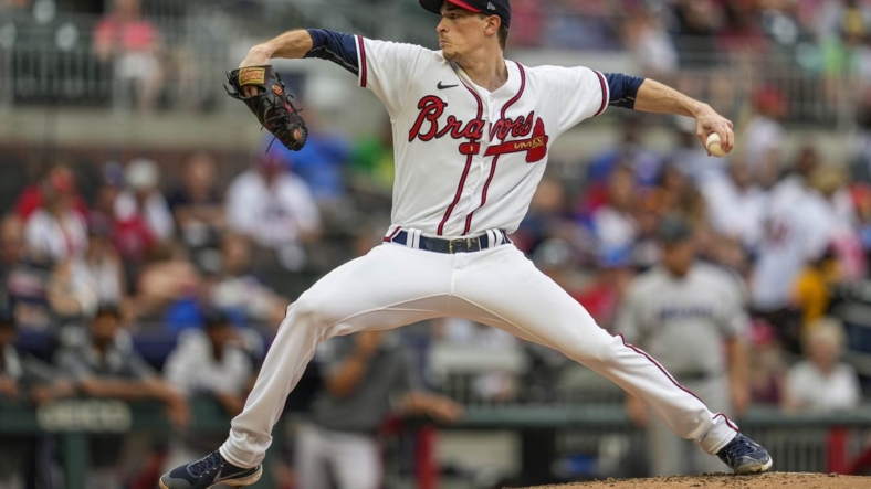 Sep 4, 2022; Cumberland, Georgia, USA; Atlanta Braves starting pitcher Max Fried (54) pitches against the Miami Marlins during the second inning at Truist Park. Mandatory Credit: Dale Zanine-USA TODAY Sports