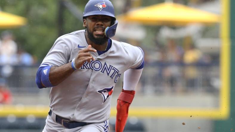 Sep 4, 2022; Pittsburgh, Pennsylvania, USA;  Toronto Blue Jays Toronto Blue Jays right fielder Teoscar Hernandez (37) runs from first base to third base against the Pittsburgh Pirates during the seventh inning at PNC Park. Mandatory Credit: Charles LeClaire-USA TODAY Sports