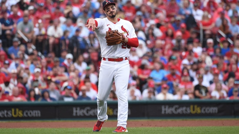 Sep 4, 2022; St. Louis, Missouri, USA; St. Louis Cardinals third baseman Nolan Arenado (28) throws to first base for an out against the Chicago Cubs in the second inning at Busch Stadium. Mandatory Credit: Joe Puetz-USA TODAY Sports