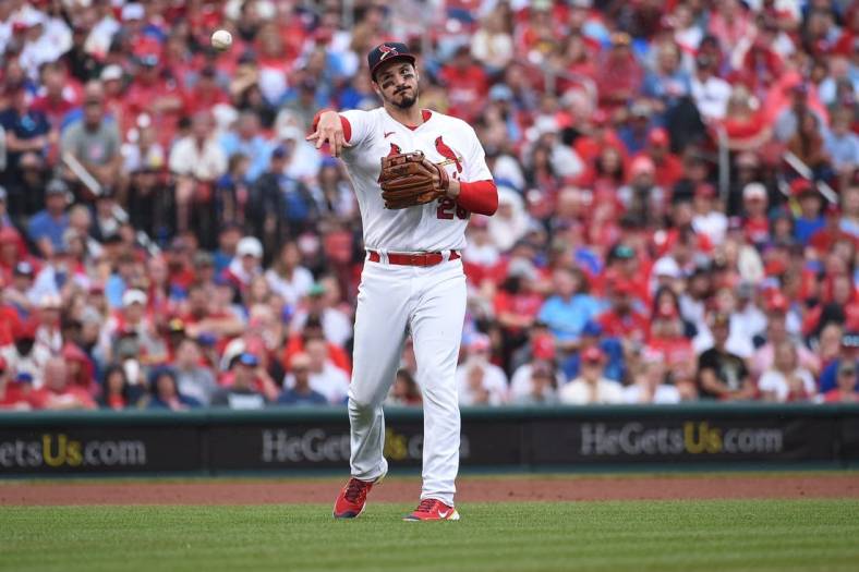 Sep 4, 2022; St. Louis, Missouri, USA; St. Louis Cardinals third baseman Nolan Arenado (28) throws to first base for an out against the Chicago Cubs in the second inning at Busch Stadium. Mandatory Credit: Joe Puetz-USA TODAY Sports