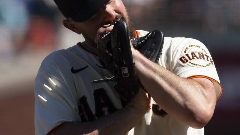 Sep 4, 2022; San Francisco, California, USA; San Francisco Giants starting pitcher Carlos Rodon (16) reacts to a ball four call during the sixth inning against the Philadelphia Phillies at Oracle Park. Mandatory Credit: D. Ross Cameron-USA TODAY Sports