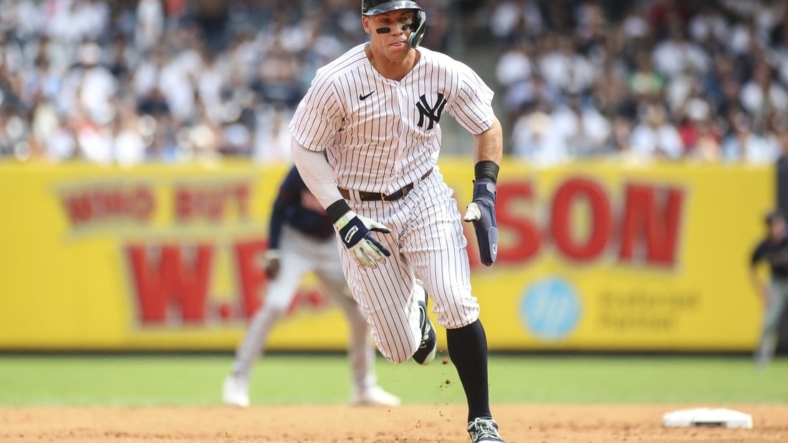 Sep 5, 2022; Bronx, New York, USA;  New York Yankees center fielder Aaron Judge (99) runs home to score the first run of the game in the first inning against the Minnesota Twins at Yankee Stadium. Mandatory Credit: Wendell Cruz-USA TODAY Sports