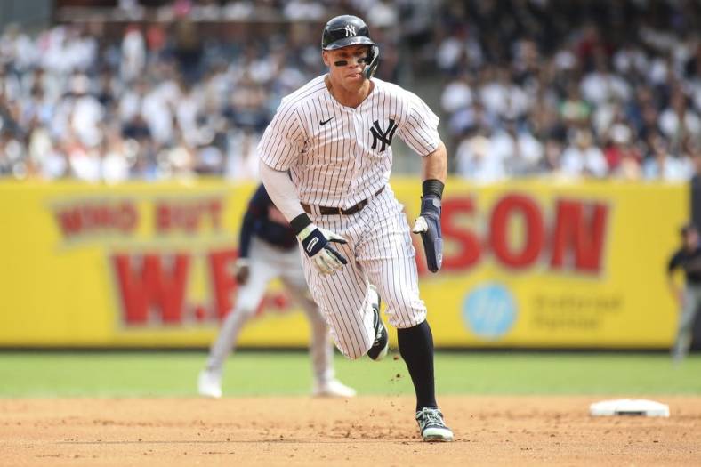 Sep 5, 2022; Bronx, New York, USA;  New York Yankees center fielder Aaron Judge (99) runs home to score the first run of the game in the first inning against the Minnesota Twins at Yankee Stadium. Mandatory Credit: Wendell Cruz-USA TODAY Sports
