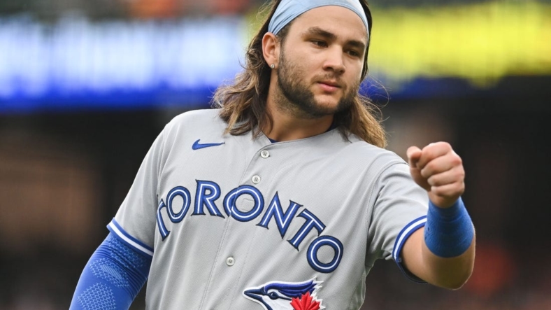 Sep 5, 2022; Baltimore, Maryland, USA;  Toronto Blue Jays shortstop Bo Bichette (11) stand son the field during the first inning against the Baltimore Orioles at Oriole Park at Camden Yards. Mandatory Credit: Tommy Gilligan-USA TODAY Sports