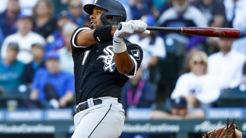 Sep 5, 2022; Seattle, Washington, USA; Chicago White Sox shortstop Elvis Andrus (1) hits a double against the Seattle Mariners during the fifth inning at T-Mobile Park. Mandatory Credit: Joe Nicholson-USA TODAY Sports