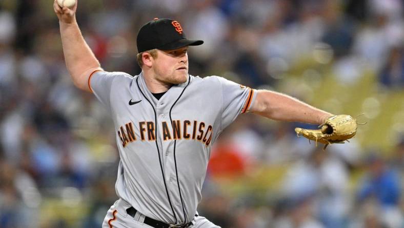 Sep 5, 2022; Los Angeles, California, USA;  San Francisco Giants starting pitcher Logan Webb (62) throws to the plate in the first inning against the Los Angeles Dodgers at Dodger Stadium. Mandatory Credit: Jayne Kamin-Oncea-USA TODAY Sports