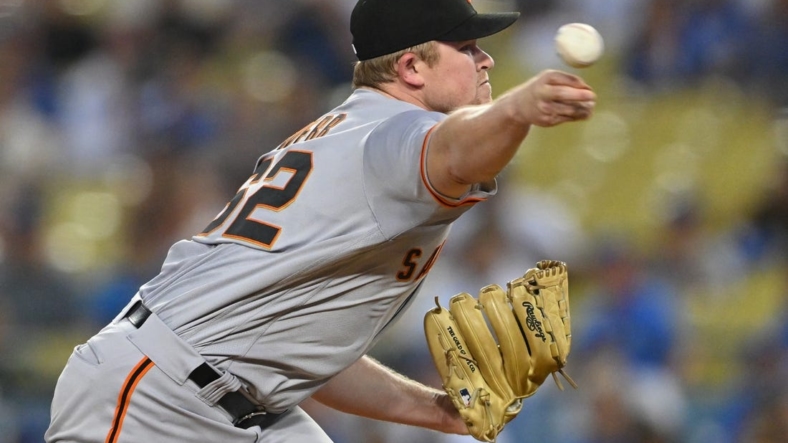 Sep 5, 2022; Los Angeles, California, USA;  San Francisco Giants starting pitcher Logan Webb (62) throws to the plate in the first inning against the Los Angeles Dodgers at Dodger Stadium. Mandatory Credit: Jayne Kamin-Oncea-USA TODAY Sports