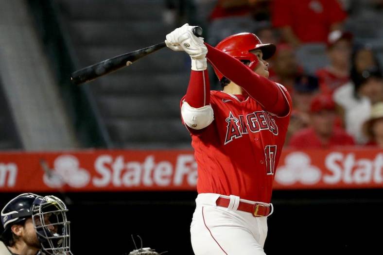 Sep 5, 2022; Anaheim, California, USA;  Los Angeles Angels designated hitter Shohei Ohtani (17) hits a home run during the seventh inning against the Detroit Tigers at Angel Stadium. Mandatory Credit: Kiyoshi Mio-USA TODAY Sports