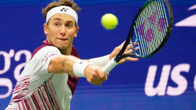 Sept 6, 2022; Flushing, NY, USA;  Casper Ruud of Norway hits to Matteo Berrettini of Italy on day nine of the 2022 U.S. Open tennis tournament at USTA Billie Jean King National Tennis Center. Mandatory Credit: Robert Deutsch-USA TODAY Sports