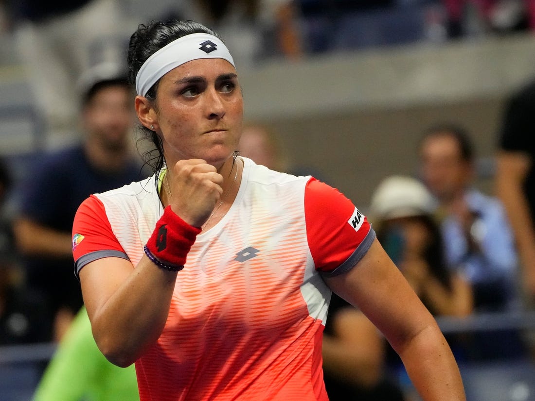 Sept 6, 2022; Flushing, NY, USA;  Ons Jabeur of Tunesia celebrates match point against Ajla Tomljanovic of Australia on day nine of the 2022 U.S. Open tennis tournament at USTA Billie Jean King National Tennis Center. Mandatory Credit: Robert Deutsch-USA TODAY Sports