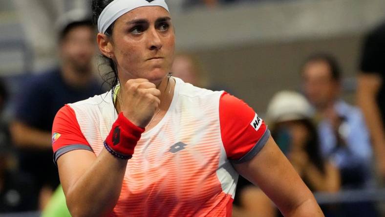 Sept 6, 2022; Flushing, NY, USA;  Ons Jabeur of Tunesia celebrates match point against Ajla Tomljanovic of Australia on day nine of the 2022 U.S. Open tennis tournament at USTA Billie Jean King National Tennis Center. Mandatory Credit: Robert Deutsch-USA TODAY Sports