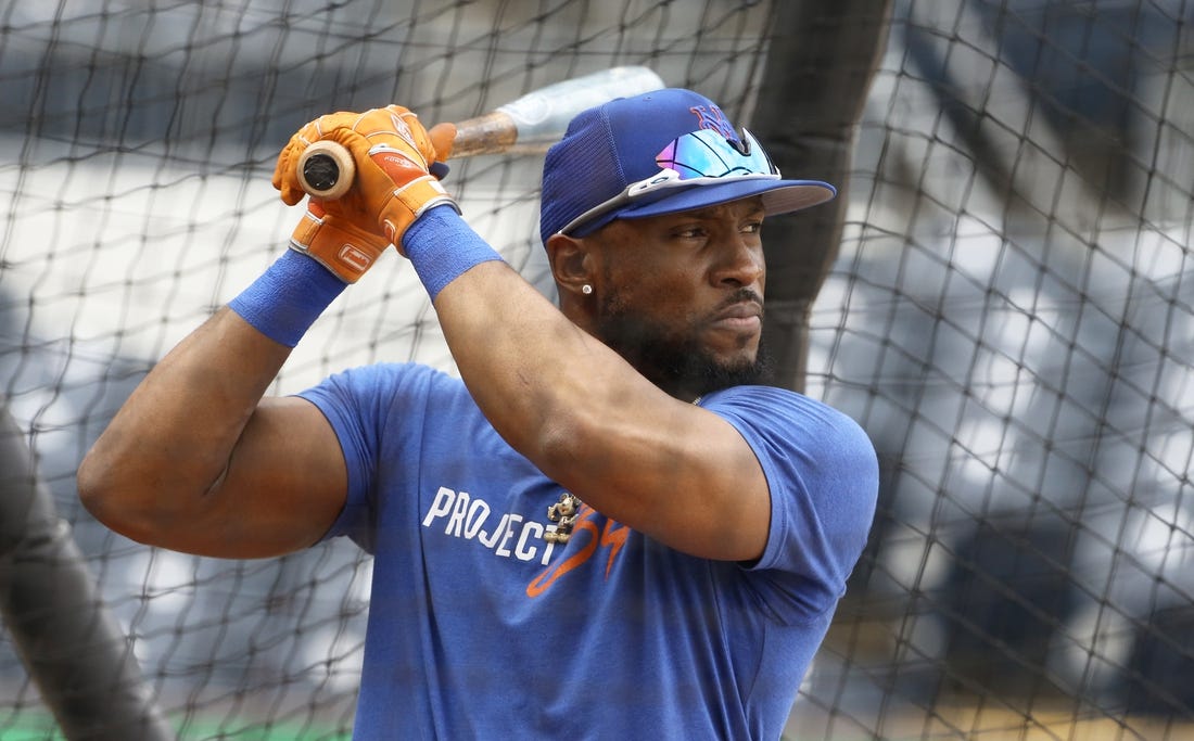 Mets' Starling Marte exits after taking pitch on hand
