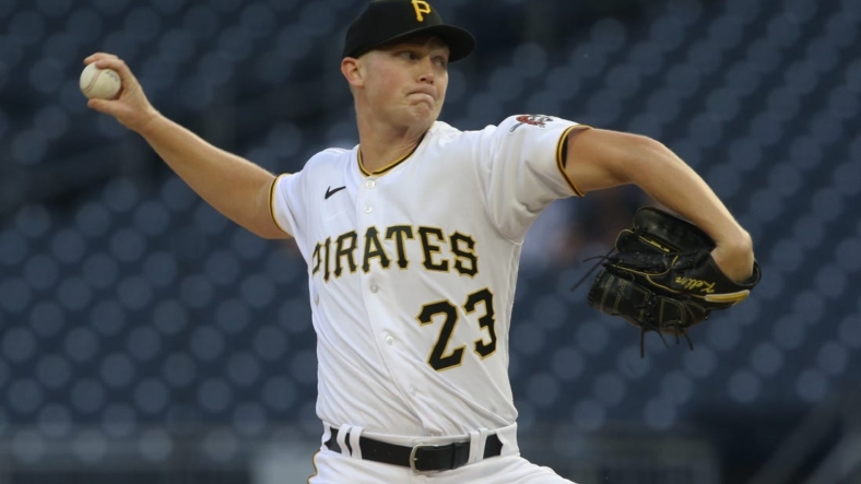 Sep 6, 2022; Pittsburgh, Pennsylvania, USA;  Pittsburgh Pirates starting pitcher Mitch Keller (23) delivers a pitch against the New York Mets during the first inning at PNC Park. Mandatory Credit: Charles LeClaire-USA TODAY Sports