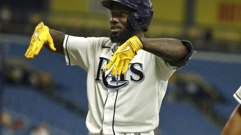 Sep 6, 2022; St. Petersburg, Florida, USA;Tampa Bay Rays left fielder Randy Arozarena (56) celebrates after he hit a three-run home run against the Boston Red Sox during the first inning at Tropicana Field. Mandatory Credit: Kim Klement-USA TODAY Sports