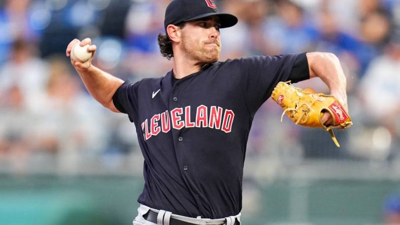 Sep 6, 2022; Kansas City, Missouri, USA; Cleveland Guardians starting pitcher Shane Bieber (57) pitches against the Kansas City Royals during the first inning at Kauffman Stadium. Mandatory Credit: Jay Biggerstaff-USA TODAY Sports