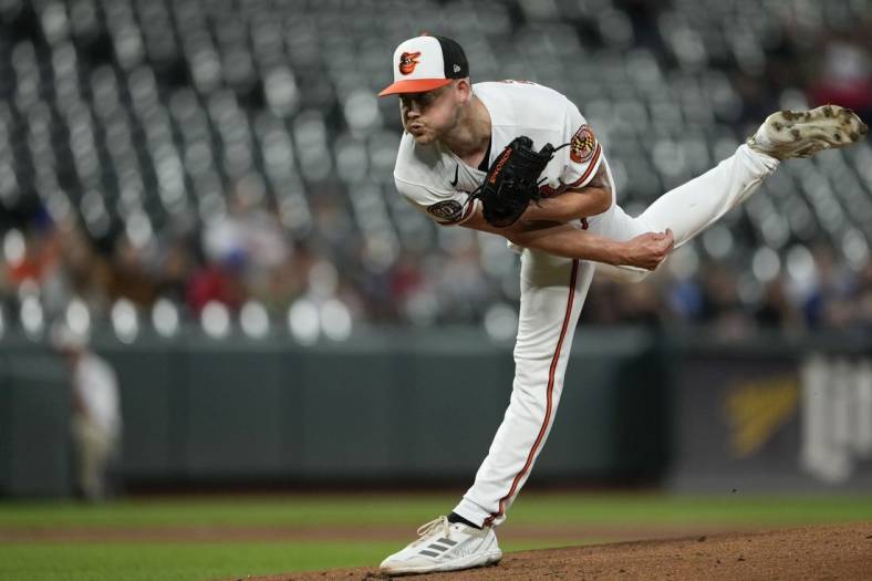 Sep 6, 2022; Baltimore, Maryland, USA; Baltimore Orioles starting pitcher Kyle Bradish (56) pitches against the Toronto Blue Jays during the first inning at Oriole Park at Camden Yards. Mandatory Credit: Brent Skeen-USA TODAY Sports