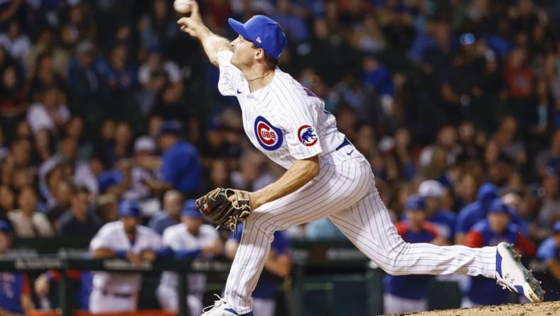 Sep 6, 2022; Chicago, Illinois, USA; Chicago Cubs relief pitcher Hayden Wesneski (19) delivers against the Cincinnati Reds during the fifth inning at Wrigley Field. Mandatory Credit: Kamil Krzaczynski-USA TODAY Sports