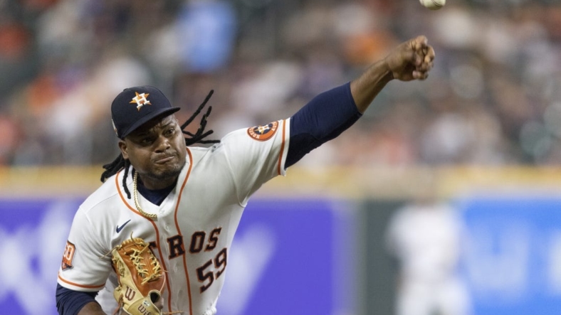 Sep 6, 2022; Houston, Texas, USA; Houston Astros starting pitcher Framber Valdez (59) pitches against the Texas Rangers in the fourth inning at Minute Maid Park. Mandatory Credit: Thomas Shea-USA TODAY Sports