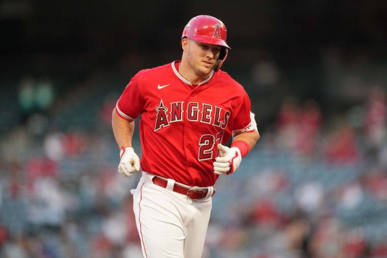 Sep 6, 2022; Anaheim, California, USA;  Los Angeles Angels center fielder Mike Trout (27) rounds the bases after hitting a solo home run in the first inning against the Detroit Tigers at Angel Stadium. Mandatory Credit: Kirby Lee-USA TODAY Sports