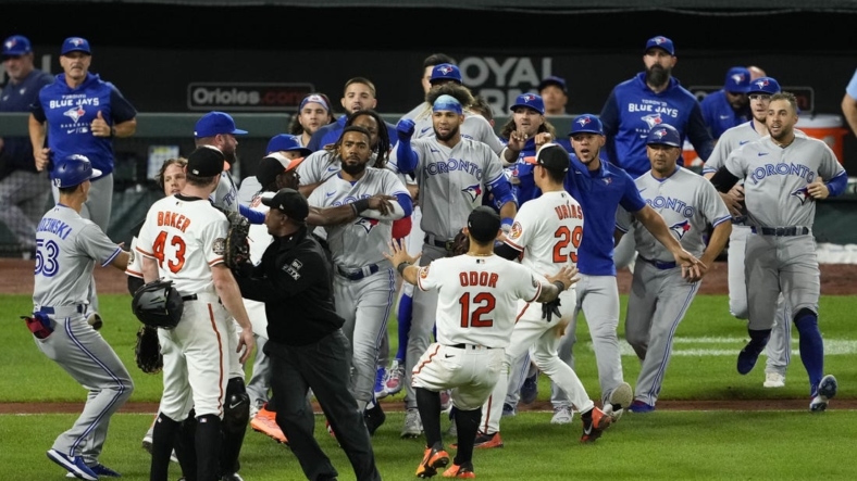 Sep 6, 2022; Baltimore, Maryland, USA; Players for both the Baltimore Orioles and Toronto Blue Jays clear their benches in an argument in the middle of the 7th inning at Oriole Park at Camden Yards. Mandatory Credit: Brent Skeen-USA TODAY Sports