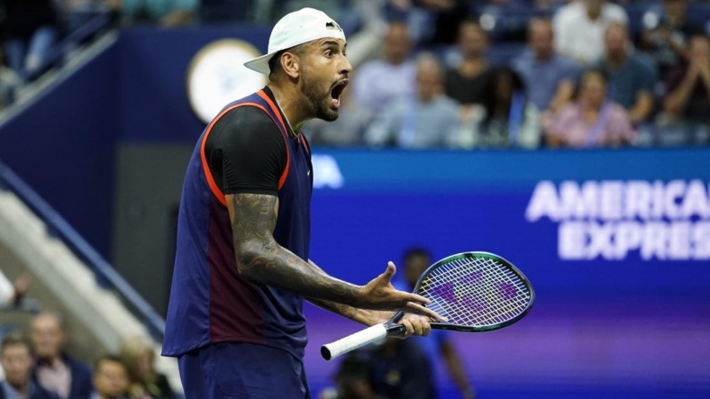Sep 6, 2022; Flushing, NY, USA; Nick Kyrgios of Australia yells to his player's box after losing a game in the third set to Karen Khachanov (not pictured) on day nine of the 2022 U.S. Open tennis tournament at USTA Billie Jean King Tennis Center. Mandatory Credit: Danielle Parhizkaran-USA TODAY Sports