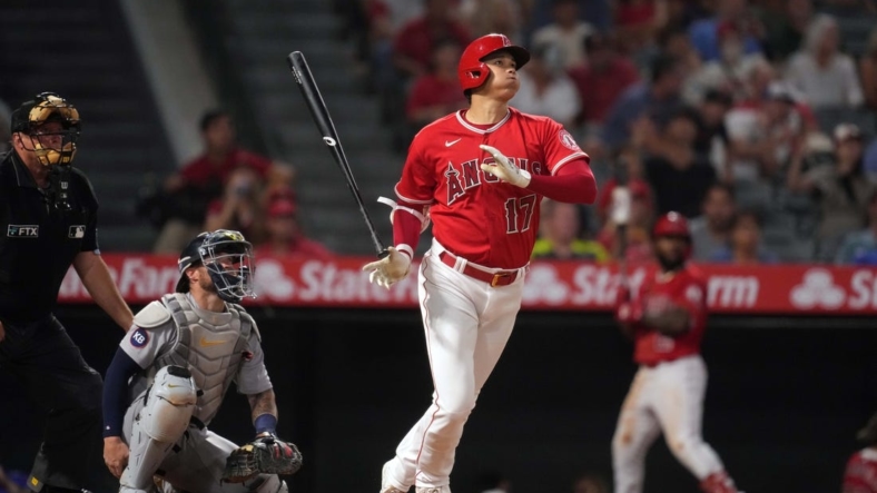 Sep 6, 2022; Anaheim, California, USA; Los Angeles Angels designated hitter Shohei Ohtani (17) bats in the sixth inning as Detroit Tigers catcher Tucker Barnhart (15) watches at Angel Stadium. Mandatory Credit: Kirby Lee-USA TODAY Sports