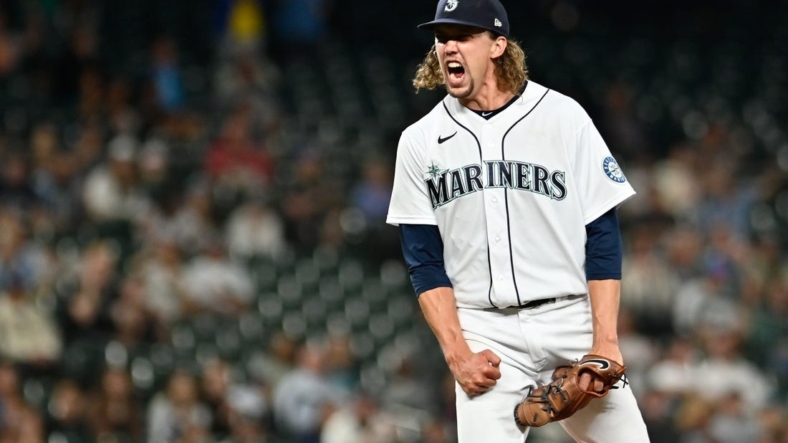 Sep 6, 2022; Seattle, Washington, USA; Seattle Mariners starting pitcher Logan Gilbert (36) celebrates getting the last out of the inning against the Chicago White Sox during the sixth inning at T-Mobile Park. Mandatory Credit: Steven Bisig-USA TODAY Sports