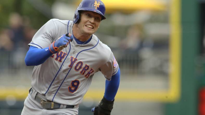 Sep 7, 2022; Pittsburgh, Pennsylvania, USA;  New York Mets center fielder Brandon Nimmo (9) runs from first base to third against the Pittsburgh Pirates during the first inning at PNC Park. Mandatory Credit: Charles LeClaire-USA TODAY Sports