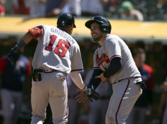 Sep 7, 2022; Oakland, California, USA; Atlanta Braves second baseman Vaughn Grissom (18) is greeted by catcher Travis d'Arnaud (16) after hitting a two run home against the Oakland Athletics during the fifth inning at RingCentral Coliseum. Mandatory Credit: D. Ross Cameron-USA TODAY Sports