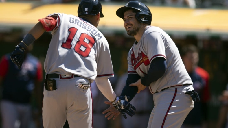 Sep 7, 2022; Oakland, California, USA; Atlanta Braves second baseman Vaughn Grissom (18) is greeted by catcher Travis d'Arnaud (16) after hitting a two run home against the Oakland Athletics during the fifth inning at RingCentral Coliseum. Mandatory Credit: D. Ross Cameron-USA TODAY Sports