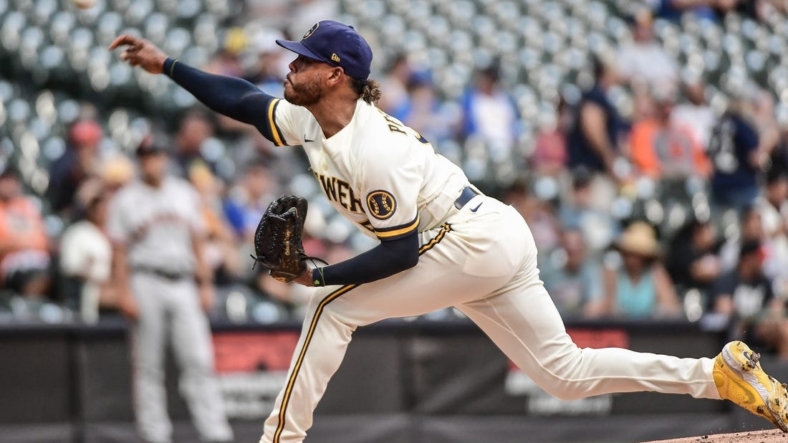 Sep 8, 2022; Milwaukee, Wisconsin, USA; Milwaukee Brewers starting pitcher Freddy Peralta (51) throws a pitch in the first inning against the San Francisco Giants at American Family Field. Mandatory Credit: Benny Sieu-USA TODAY Sports